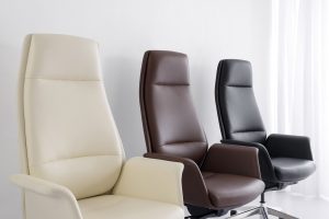 Leather executive chairs in almond, brown, and black