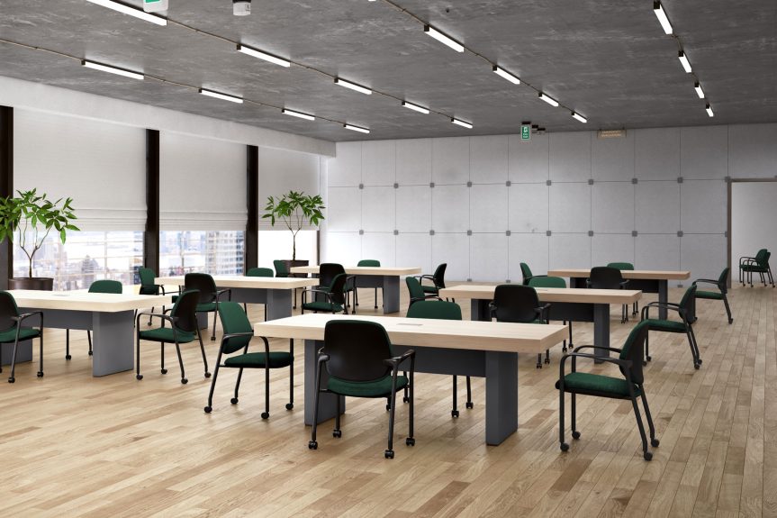 Green and black stacking chairs around tables