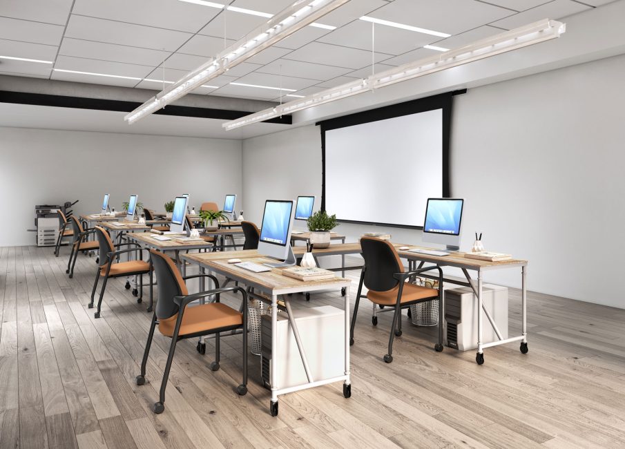 Gold and black stacking chairs in classroom
