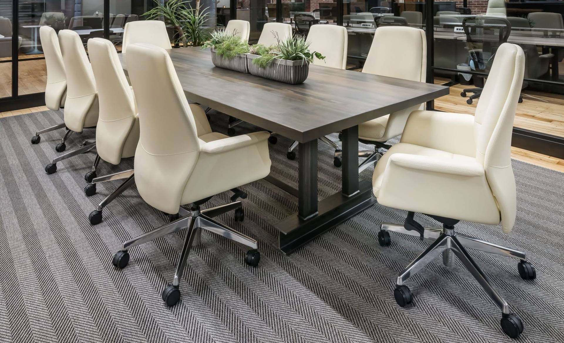 Stylish conference room with table and off-white Italian leather chairs